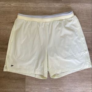 Cream colored fabletics workout shorts with liner. Size: XL. Brand new